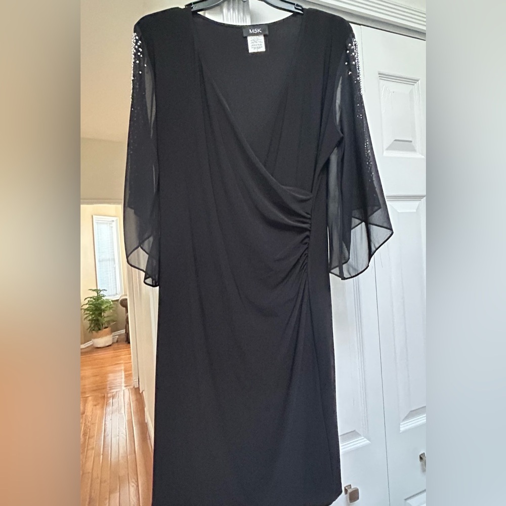 Black dress with  jeweled cold shoulder sleeves